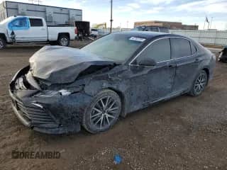 2022 Toyota Camry XLE with VIN 4T1F11BK5NU055762, listed as a Copart auction lot 42785795 with 89,129 mi miles and Salvage title. Bid and sale history available at DreamBid. Image 1.