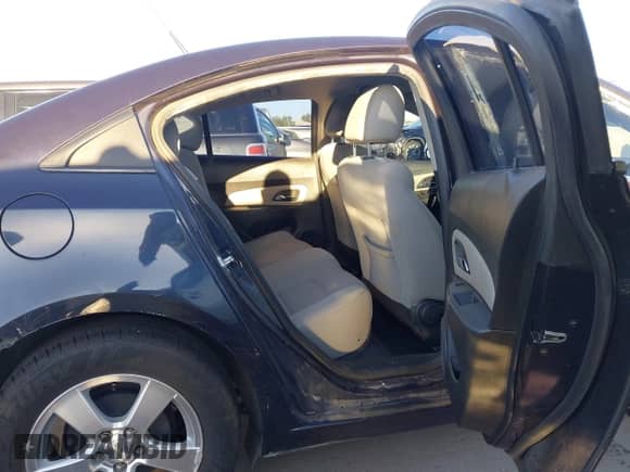 2014 Chevrolet Cruze 1LT z VIN 1G1PC5SB0E7306270, wystawiony jako IAAI lot #43335671 z przebiegiem 125 429 mil mil oraz . Historia ofert i sprzedaży dostępna na DreamBid. Obrazek 8.