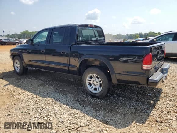 2004 Dodge Dakota Sport with VIN 1D7HL38K54S520454, listed as a Copart auction lot 64086085 with 225,994 mi miles and Salvage title. Bid and sale history available at DreamBid. Image 2.