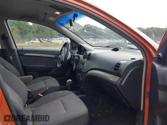2007 Chevrolet Aveo LS with VIN KL1TD56657B125432, listed as a IAAI auction lot 43201788 with 102,474 mi miles and . Bid and sale history available at DreamBid. Image 5.