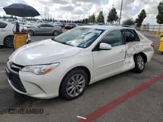 2016 Toyota Camry SE with VIN 4T1BF1FK4GU252645, listed as a Copart auction lot 82498975 with 84,761 mi miles and Salvage title. Bid and sale history available at DreamBid. Image 1.