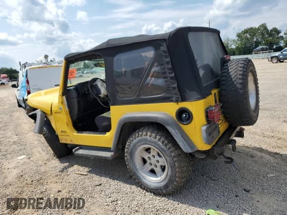 2006 Jeep Wrangler Sport z VIN 1J4FA49S16P732554, wystawiony jako Copart lot #70663185 z przebiegiem 124 922 mil mil oraz Szkoda całkowita • Salvage title. Historia ofert i sprzedaży dostępna na DreamBid. Obrazek 2.