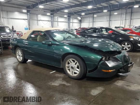 1995 Chevrolet Camaro Z28 z VIN 2G1FP32PXS2118150, wystawiony jako Copart lot #75444944 z przebiegiem 123 778 mil mil oraz Szkoda całkowita • Salvage title. Historia ofert i sprzedaży dostępna na DreamBid. Obrazek 4.