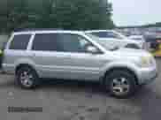 2006 Honda Pilot EX-L z VIN 2HKYF18566H538804, wystawiony jako IAAI lot #42911234 z przebiegiem 153 990 mil mil oraz . Historia ofert i sprzedaży dostępna na DreamBid. Obrazek 14.