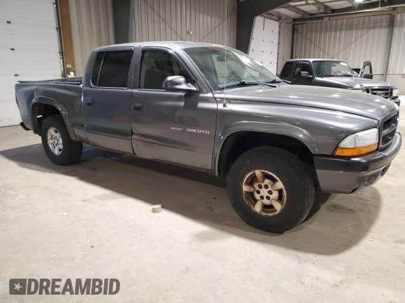 2002 Dodge Dakota Sport с VIN 1B7HG38N02S587775, выставлен на аукционе Copart как лот 53423675 с пробегом 188 900 миль миль и Списание • Salvage title. История ставок и продаж доступна на DreamBid. Изображение 4.