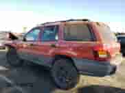 2003 Jeep Grand Cherokee Laredo z VIN 1J4GX48S13C547993, wystawiony jako Copart lot #67148165 z przebiegiem Nie podano mil oraz Szkoda całkowita • Salvage title. Historia ofert i sprzedaży dostępna na DreamBid. Obrazek 2.