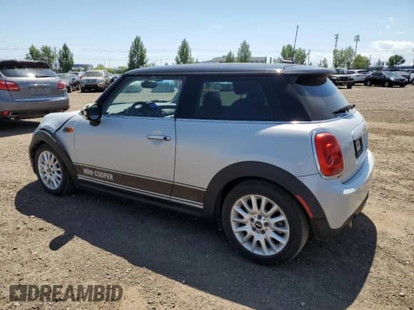 2015 MINI Hardtop with VIN WMWXM5C51F3A04184, listed as a Copart auction lot 63742035 with 150,029 mi miles and Salvage title. Bid and sale history available at DreamBid. Image 2.