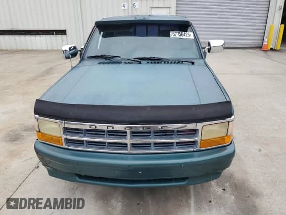 1993 Dodge Dakota z VIN 1B7FL23X3PS153914, wystawiony jako Copart lot #67756425 z przebiegiem 277 083 mil mil oraz Szkoda całkowita • Salvage title. Historia ofert i sprzedaży dostępna na DreamBid. Obrazek 5.