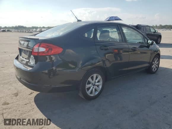 2012 Ford Fiesta SE with VIN 3FADP4BJ7CM155713, listed as a Copart auction lot 69510645 with 94,395 mi miles and Salvage title. Bid and sale history available at DreamBid. Image 3.