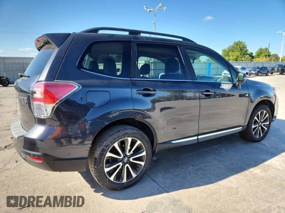 2017 Subaru Forester Touring z VIN JF2SJGWC1HH551911, wystawiony jako Copart lot #84236215 z przebiegiem 59 041 mil mil oraz Czysty tytuł • Clean title. Historia ofert i sprzedaży dostępna na DreamBid. Obrazek 3.