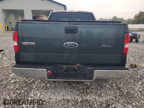 2005 Ford F-150 XLT with VIN 1FTPX12595NA46140, listed as a Copart auction lot 82141515 with 156,879 mi miles and Salvage title. Bid and sale history available at DreamBid. Image 6.