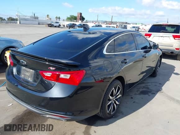 2020 Chevrolet Malibu RS with VIN 1G1ZG5STXLF135018, listed as a IAAI auction lot 43195958 with 94,145 mi miles and . Bid and sale history available at DreamBid. Image 4.