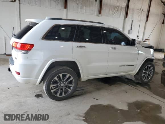 2018 Jeep Grand Cherokee High Altitude z VIN 1C4RJFCGXJC267937, wystawiony jako Copart lot #67016995 z przebiegiem 140 809 mil mil oraz Szkoda całkowita • Salvage title. Historia ofert i sprzedaży dostępna na DreamBid. Obrazek 3.