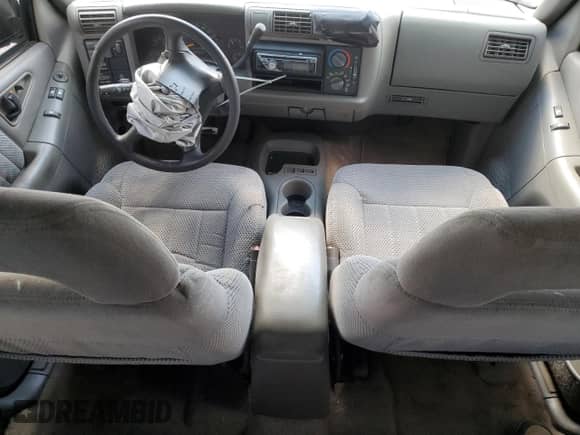 1996 Chevrolet Blazer LS с VIN 1GNCS18W2TK149760, выставлен на аукционе Copart как лот 70966534 с пробегом 306 307 миль миль и Списание • Salvage title. История ставок и продаж доступна на DreamBid. Изображение 8.