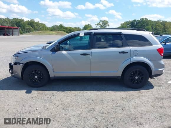 2015 Dodge Journey SXT with VIN 3C4PDDBG6FT651438, listed as a IAAI auction lot 43148226 with 127,934 mi miles and . Bid and sale history available at DreamBid. Image 13.