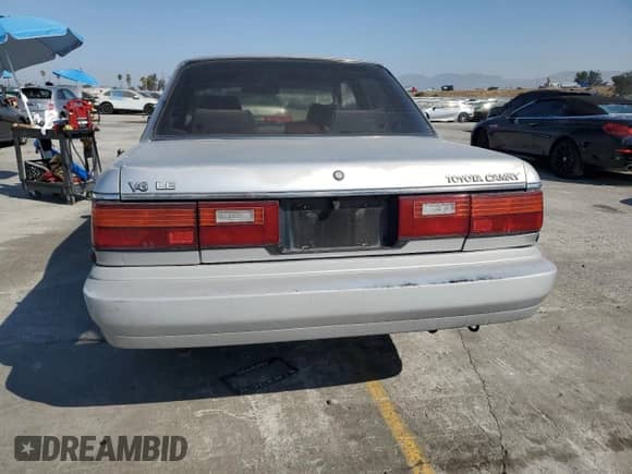 1990 Toyota Camry with VIN JT2VV22E3L3003353, listed as a Copart auction lot 68489125 with 131,662 mi miles and Clean title. Bid and sale history available at DreamBid. Image 6.