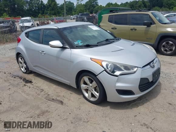 2014 Hyundai Veloster с VIN KMHTC6AD7EU184048, выставлен на аукционе IAAI как лот 42904514 с пробегом 191 749 миль миль и . История ставок и продаж доступна на DreamBid. Изображение 1.