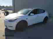 2021 Tesla Model Y Long Range с VIN 5YJYGDEEXMF297425, выставлен на аукционе Copart как лот 87047055 с пробегом 82 751 миль миль и Списание • Salvage title. История ставок и продаж доступна на DreamBid. Изображение 1.