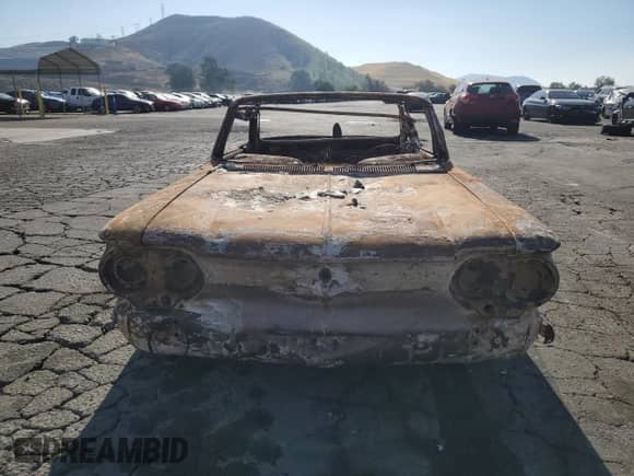 1963 Chevrolet Corvair с VIN 30967W122990, выставлен на аукционе Copart как лот 73204364 с пробегом Не указан миль и На запчасти • Non repairable. История ставок и продаж доступна на DreamBid. Изображение 5.