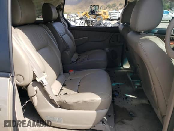 2010 Toyota Sienna XLE с VIN 5TDYK4CC9AS290084, выставлен на аукционе Copart как лот 71271375 с пробегом 95 684 миль миль и Списание • Salvage title. История ставок и продаж доступна на DreamBid. Изображение 10.