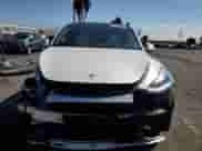 2021 Tesla Model Y Long Range с VIN 5YJYGDEE2MF243701, выставлен на аукционе Copart как лот 81344595 с пробегом 50 095 миль миль и Списание • Salvage title. История ставок и продаж доступна на DreamBid. Изображение 5.