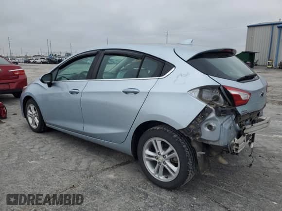 2018 Chevrolet Cruze LT z VIN 3G1BH6SE3JS572258, wystawiony jako Copart lot #59781645 z przebiegiem 87 673 mil mil oraz Szkoda całkowita • Salvage title. Historia ofert i sprzedaży dostępna na DreamBid. Obrazek 2.