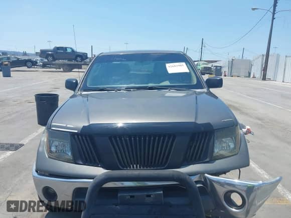 2008 Nissan Frontier SE z VIN 1N6AD07U78C406477, wystawiony jako IAAI lot #42682905 z przebiegiem Nie podano mil oraz . Historia ofert i sprzedaży dostępna na DreamBid. Obrazek 12.
