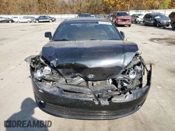 2007 Hyundai Tiburon GS with VIN KMHHM66D37U237424, listed as a Copart auction lot 77363534 with 160,018 mi miles and Salvage title. Bid and sale history available at DreamBid. Image 5.