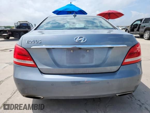 2015 Hyundai Equus Signature with VIN KMHGH4JH4FU095338, listed as a Copart auction lot 63972905 with 122,955 mi miles and Salvage title. Bid and sale history available at DreamBid. Image 6.