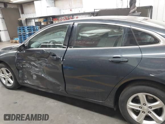 2020 Chevrolet Malibu LS z VIN 1G1ZC5ST2LF126003, wystawiony jako IAAI lot #42867700 z przebiegiem 82 749 mil mil oraz . Historia ofert i sprzedaży dostępna na DreamBid. Obrazek 14.