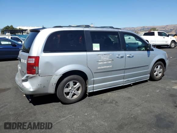 2010 Dodge Grand Caravan SXT with VIN 2D4RN5D10AR130721, listed as a Copart auction lot 80635825 with 199,299 mi miles and Salvage title. Bid and sale history available at DreamBid. Image 3.