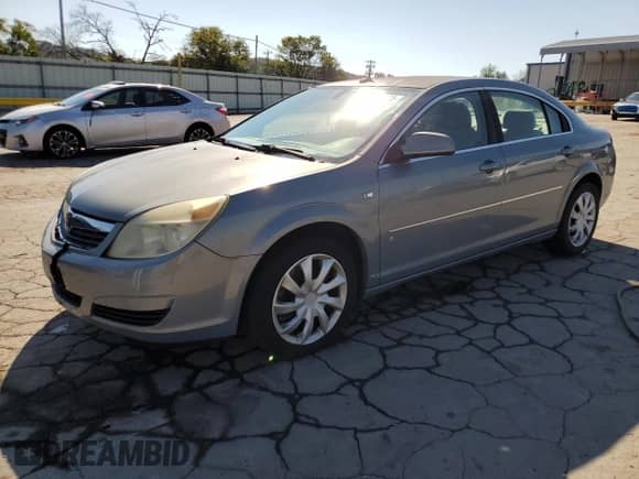 2007 Saturn Aura XE with VIN 1G8ZS57N47F175868, listed as a Copart auction lot 84814725 with 166,775 mi miles and Salvage title. Bid and sale history available at DreamBid. Image 1.