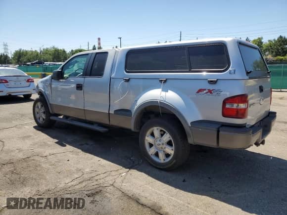 2007 Ford F-150 XLT with VIN 1FTPX04547KC33992, listed as a Copart auction lot 63262865 with 192,859 mi miles and Salvage title. Bid and sale history available at DreamBid. Image 2.
