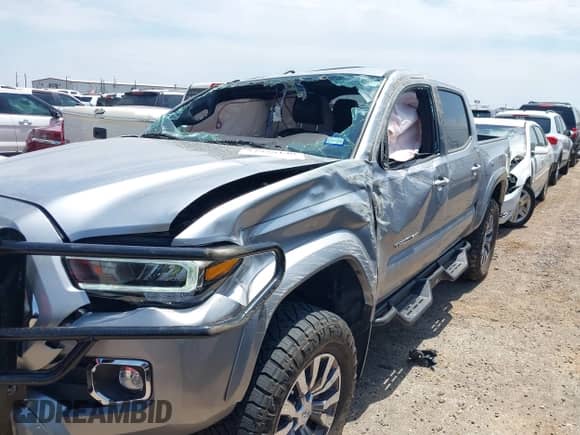 2021 Toyota Tacoma Limited with VIN 3TMGZ5AN1MM437178, listed as a IAAI auction lot 42959140 with 21,970 mi miles and . Bid and sale history available at DreamBid. Image 6.