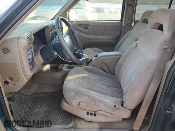 1996 Chevrolet Blazer with VIN 1GNDT13W3T2262402, listed as a Copart auction lot 62677515 with 168,312 mi miles and Salvage title. Bid and sale history available at DreamBid. Image 7.