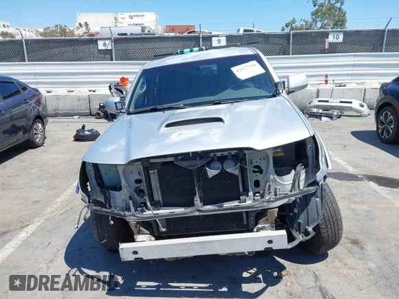 2005 Toyota Tacoma PreRunner with VIN 5TEKU72N65Z053095, listed as a IAAI auction lot 43017798 with 283,534 mi miles and . Bid and sale history available at DreamBid. Image 13.