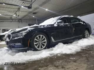 2017 BMW 7 Series 740i xDrive with VIN WBA7E4C55HGU99781, listed as a Copart auction lot 42806505 with 74,825 mi miles and Salvage title. Bid and sale history available at DreamBid. Image 1.