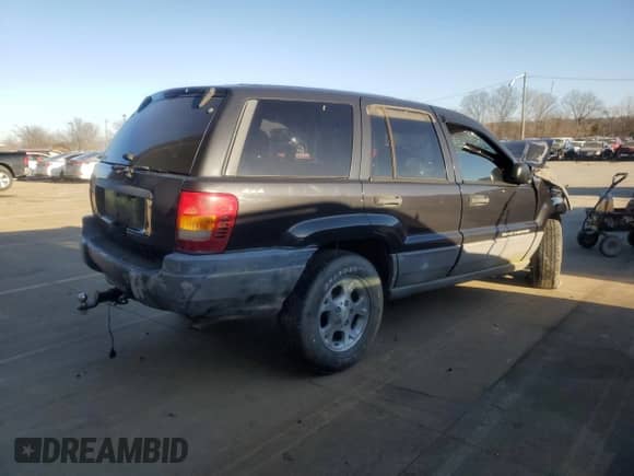 1999 Jeep Grand Cherokee Laredo с VIN 1J4GW58S9XC722831, выставлен на аукционе Copart как лот 85704104 с пробегом Не указан миль и На запчасти • Non repairable. История ставок и продаж доступна на DreamBid. Изображение 3.