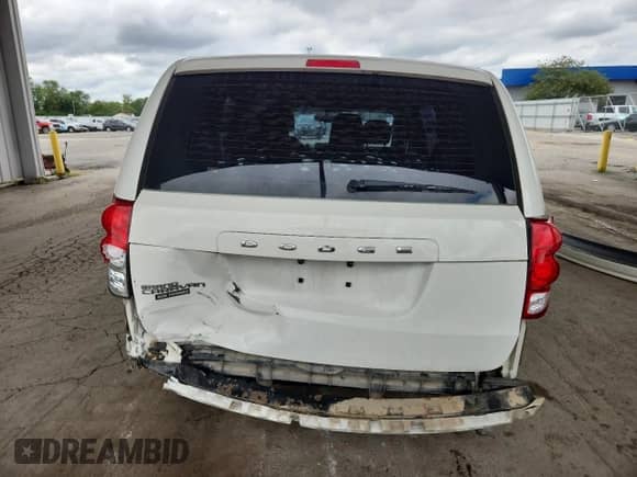 2013 Dodge Grand Caravan American Value with VIN 2C4RDGBG6DR765319, listed as a Copart auction lot 69782895 with 129,861 mi miles and Salvage title. Bid and sale history available at DreamBid. Image 6.