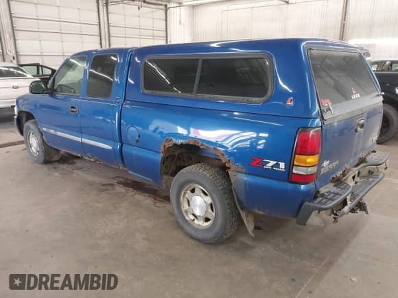 2004 GMC Sierra 1500 SLT with VIN 2GTEK19TX41240671, listed as a IAAI auction lot 43246922 with 142,164 mi miles and . Bid and sale history available at DreamBid. Image 3.