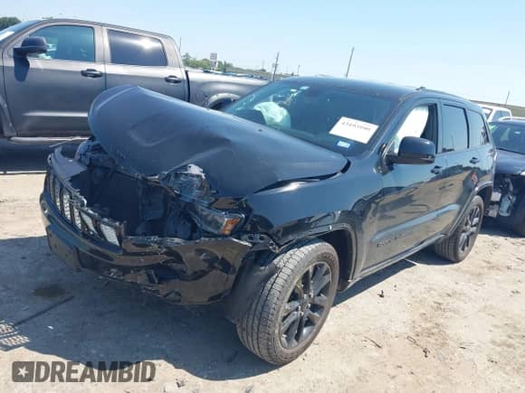 2020 Jeep Grand Cherokee Laredo E with VIN 1C4RJEAG3LC246010, listed as a IAAI auction lot 43193999 with 95,260 mi miles and . Bid and sale history available at DreamBid. Image 17.