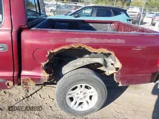 2002 Dodge Dakota SLT z VIN 1B7HG48N82S552357, wystawiony jako IAAI lot #43498260 z przebiegiem 192 220 mil mil oraz . Historia ofert i sprzedaży dostępna na DreamBid. Obrazek 6.