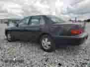 1996 Toyota Camry DX z VIN 4T1BG12K7TU811280, wystawiony jako Copart lot #72037795 z przebiegiem 110 064 mil mil oraz Szkoda całkowita • Salvage title. Historia ofert i sprzedaży dostępna na DreamBid. Obrazek 2.