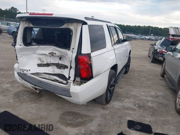 2015 Chevrolet Tahoe LT with VIN 1GNSCBKC6FR181443, listed as a IAAI auction lot 43099107 with 234,716 mi miles and . Bid and sale history available at DreamBid. Image 4.