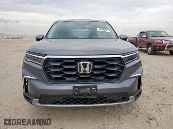 2025 Honda Pilot EX-L с VIN 5FNYG1H49SB069429, выставлен на аукционе Copart как лот 65505835 с пробегом 8 672 миль миль и Списание • Salvage title. История ставок и продаж доступна на DreamBid. Изображение 5.