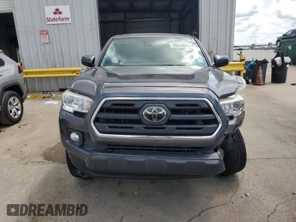 2019 Toyota Tacoma TRD Sport with VIN 5TFAZ5CN4KX078788, listed as a Copart auction lot 59543625 with 66,302 mi miles and Salvage title. Bid and sale history available at DreamBid. Image 5.