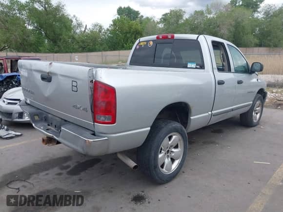 2002 Dodge 1500 z VIN 1D7HU18Z32J217089, wystawiony jako IAAI lot #42269198 z przebiegiem 176 082 mil mil oraz . Historia ofert i sprzedaży dostępna na DreamBid. Obrazek 4.
