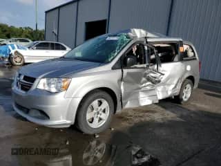 2017 Dodge Grand Caravan SE with VIN 2C4RDGBG2HR624852, listed as a Copart auction lot 84373115 with 141,702 mi miles and Salvage title. Bid and sale history available at DreamBid. Image 1.