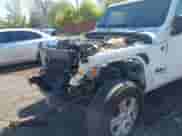 2022 Jeep Wrangler Unlimited Sport S z VIN 1C4HJXDG5NW254016, wystawiony jako IAAI lot #42214730 z przebiegiem 42 003 mil mil oraz . Historia ofert i sprzedaży dostępna na DreamBid. Obrazek 6.