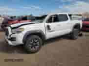 2020 Toyota Tacoma TRD Off Road с VIN 3TMCZ5AN1LM290275, выставлен на аукционе Copart как лот 81657685 с пробегом 131 128 миль миль и На запчасти • Non repairable. История ставок и продаж доступна на DreamBid. Изображение 1.